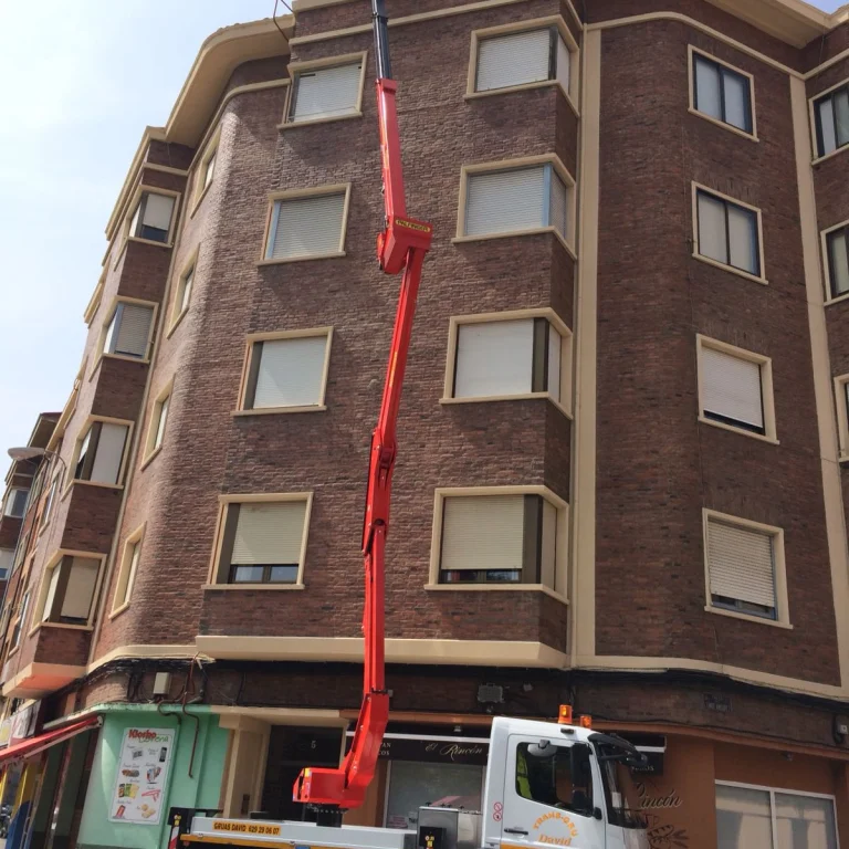 talleres tailon - grúa elevadora en edificio